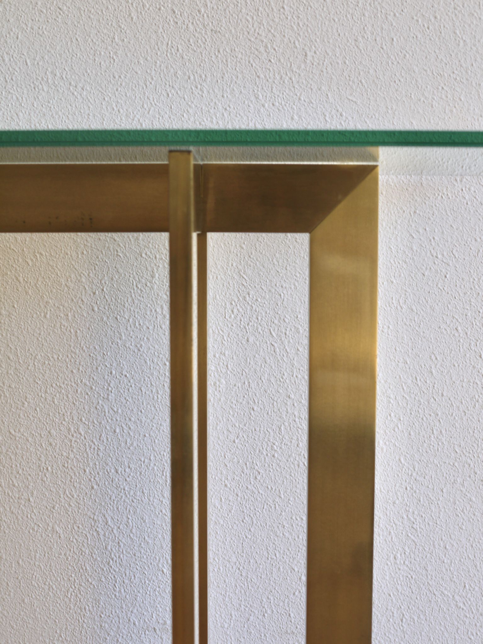Modernist brass and glass console table & mirror. 1970s