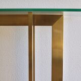 Modernist brass and glass console table & mirror. 1970s