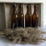 Set of 4 old amber bottles