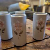 Set of 6 stoneware mazagrans with relief floral decoration – 1980s