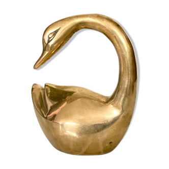 Old brass swan