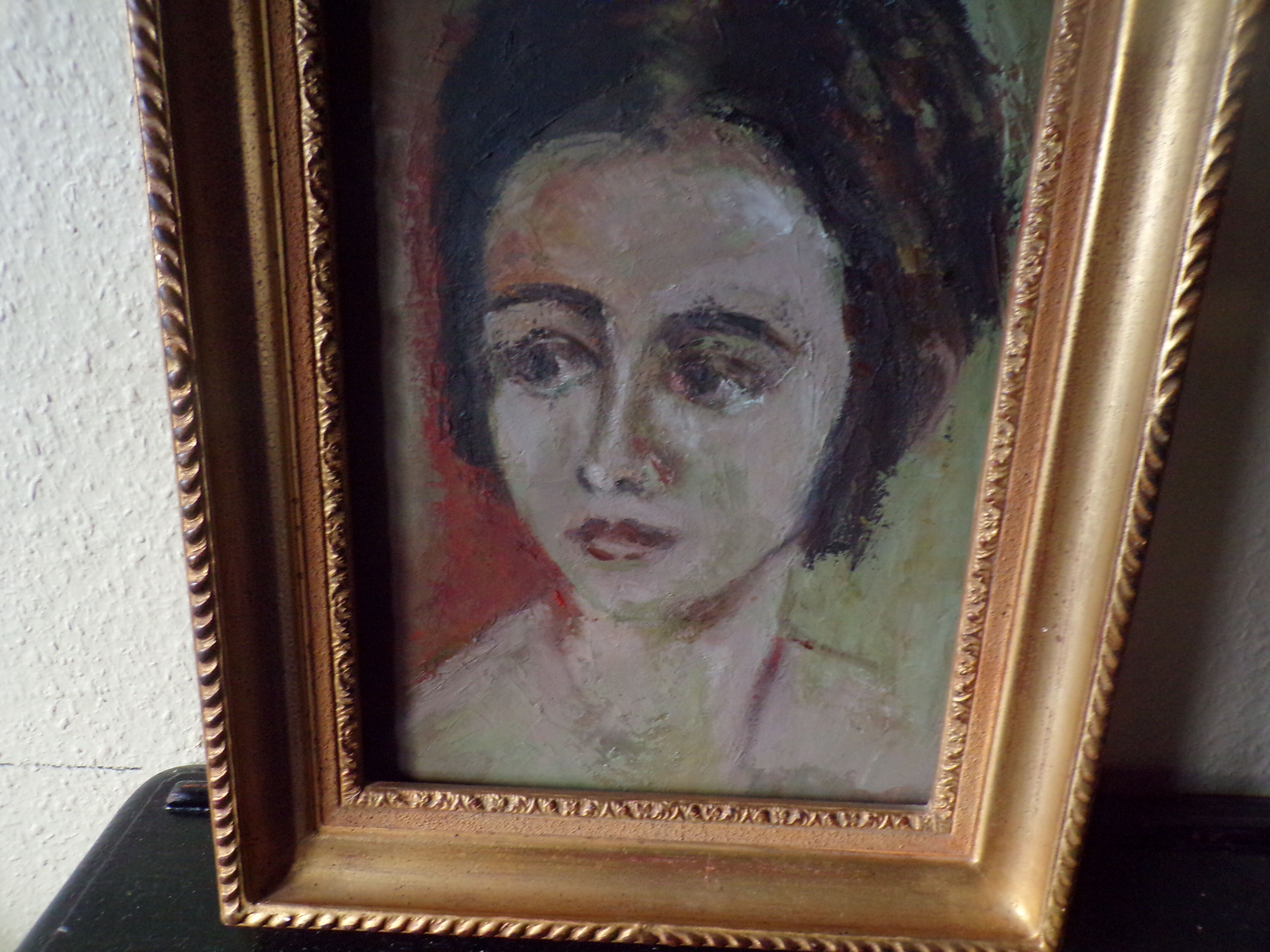 Portrait of young woman table XX century