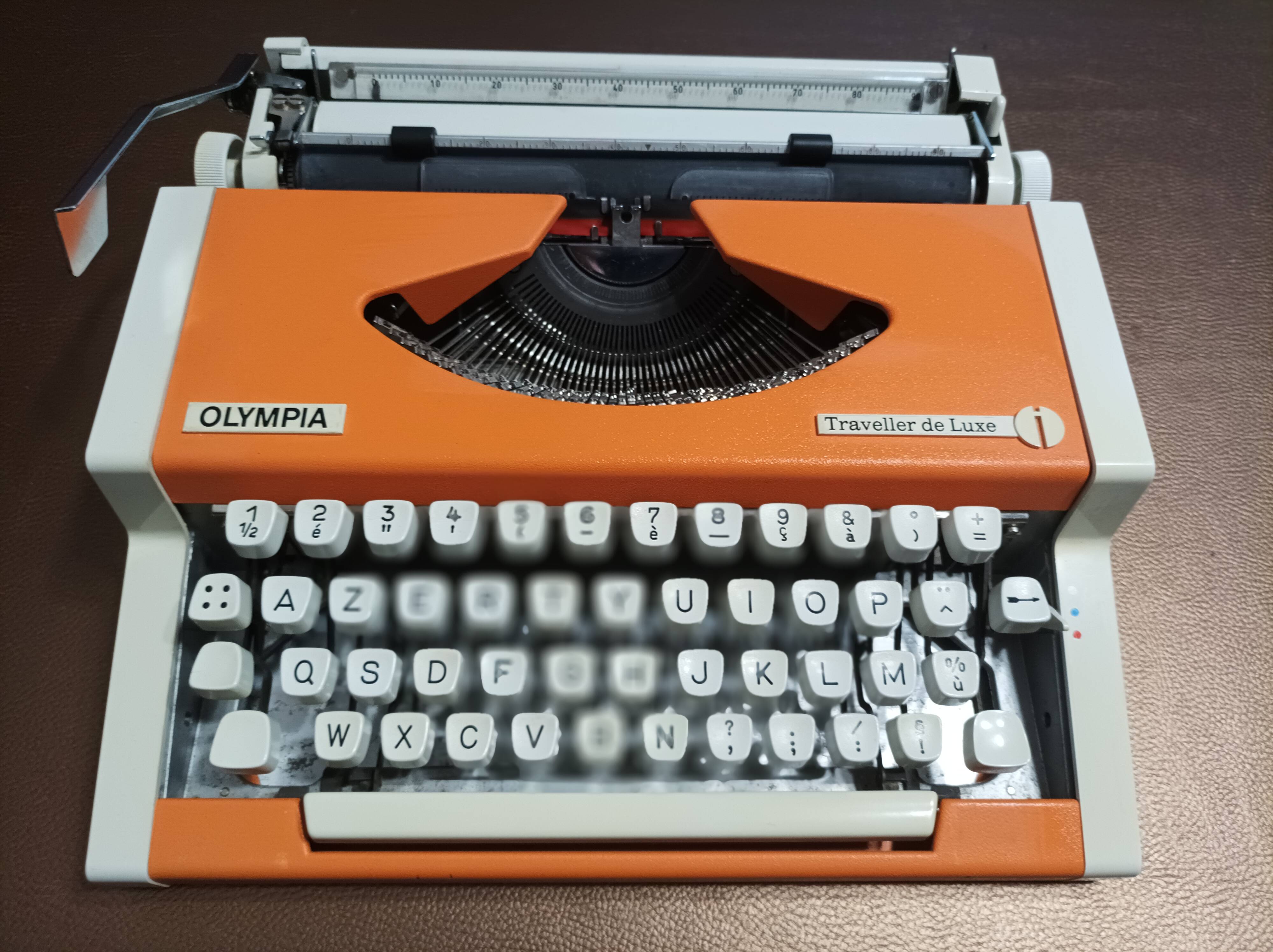 Olympia traveler de luxe orange typewriter serviced and new ribbon