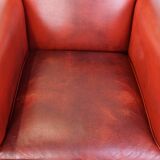 Fauteuil en cuir de mouton rouge