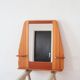Wall mirror with a solid pine frame, integrated shelf.