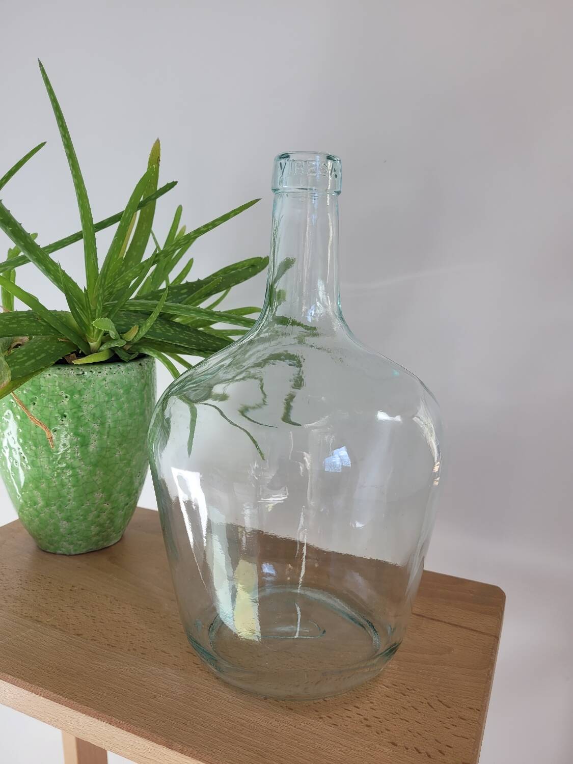 Transparent demijohn vase