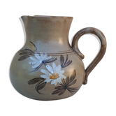 Pitcher in flowery sandstone