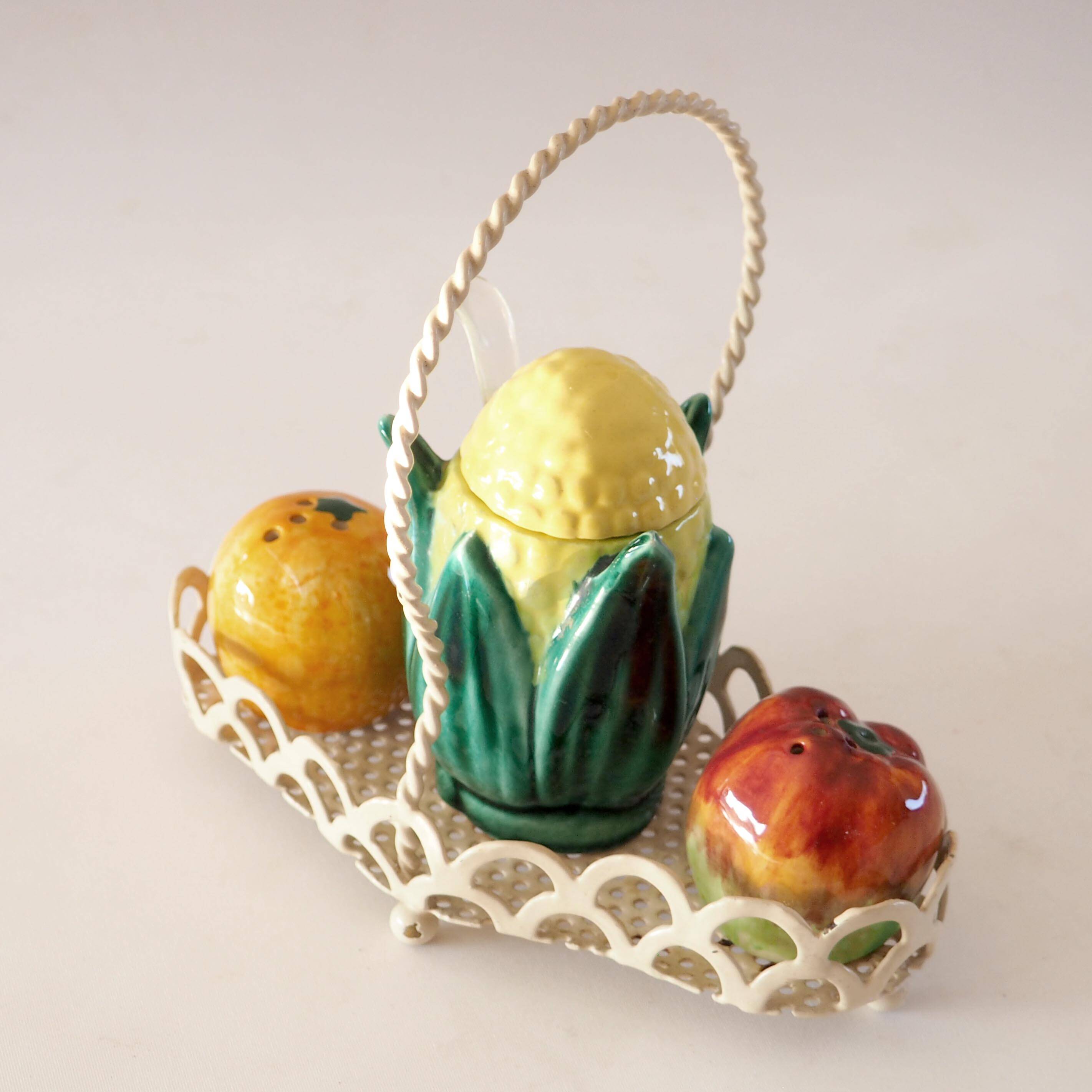 Salt and pepper set in slip and its basket