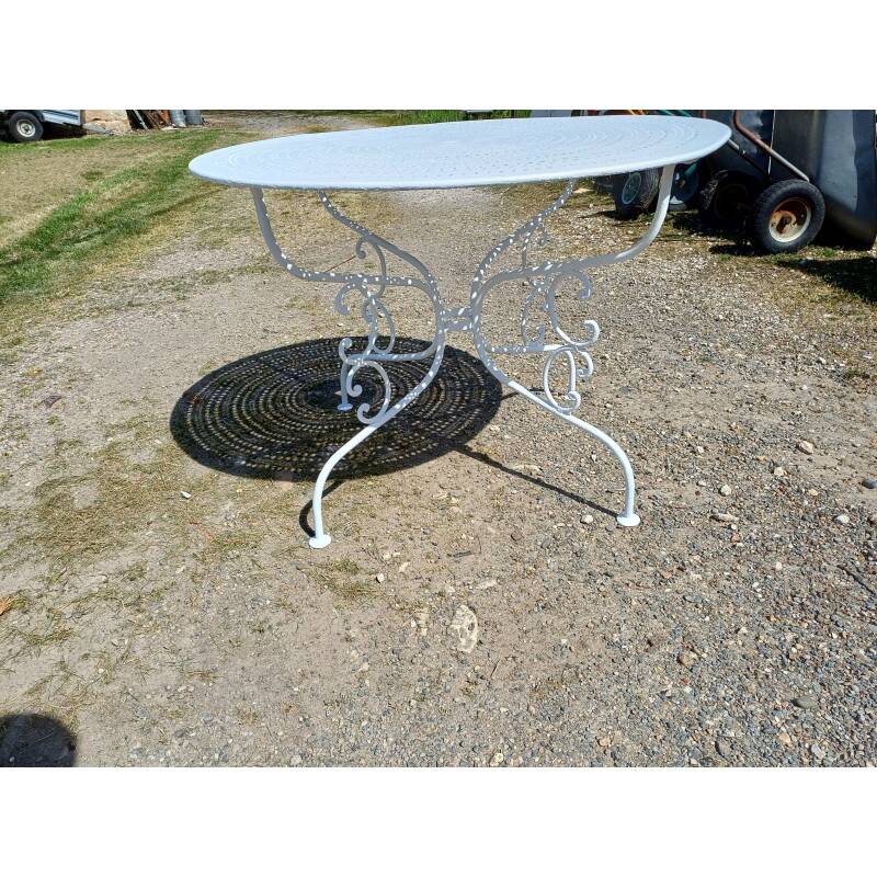 Wrought iron garden table, circa 1900