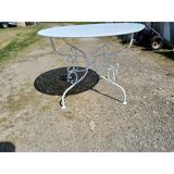 Wrought iron garden table, circa 1900