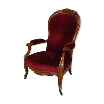 Walnut and velvet armchair