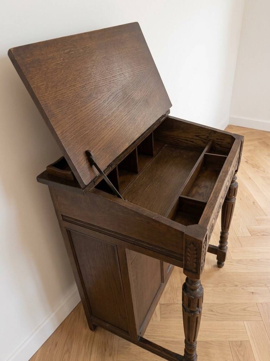 Antique wooden desk with a leather top.