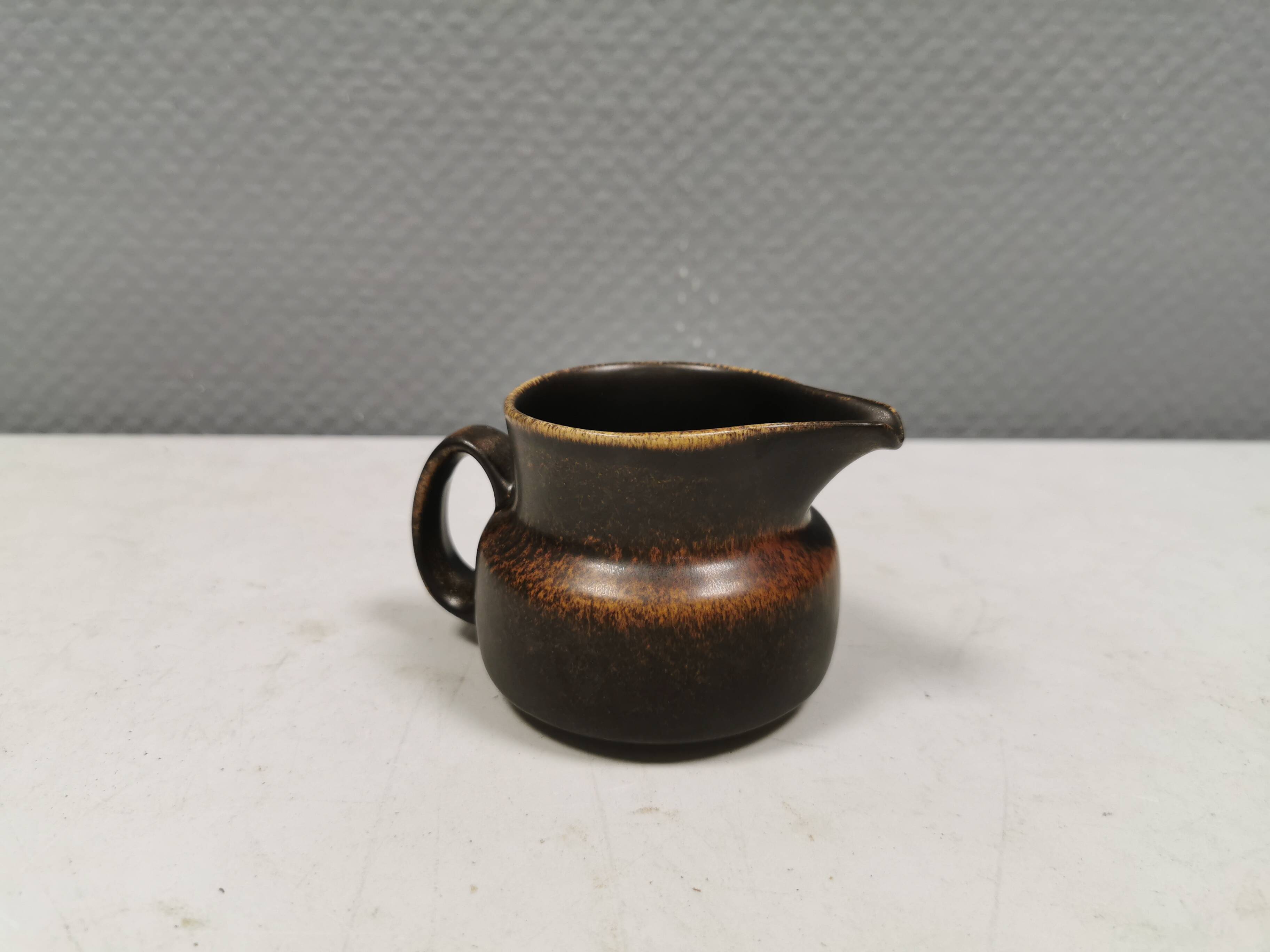 Very nice cream jug in hare fur glaze, Danish and from the 1970-80s.