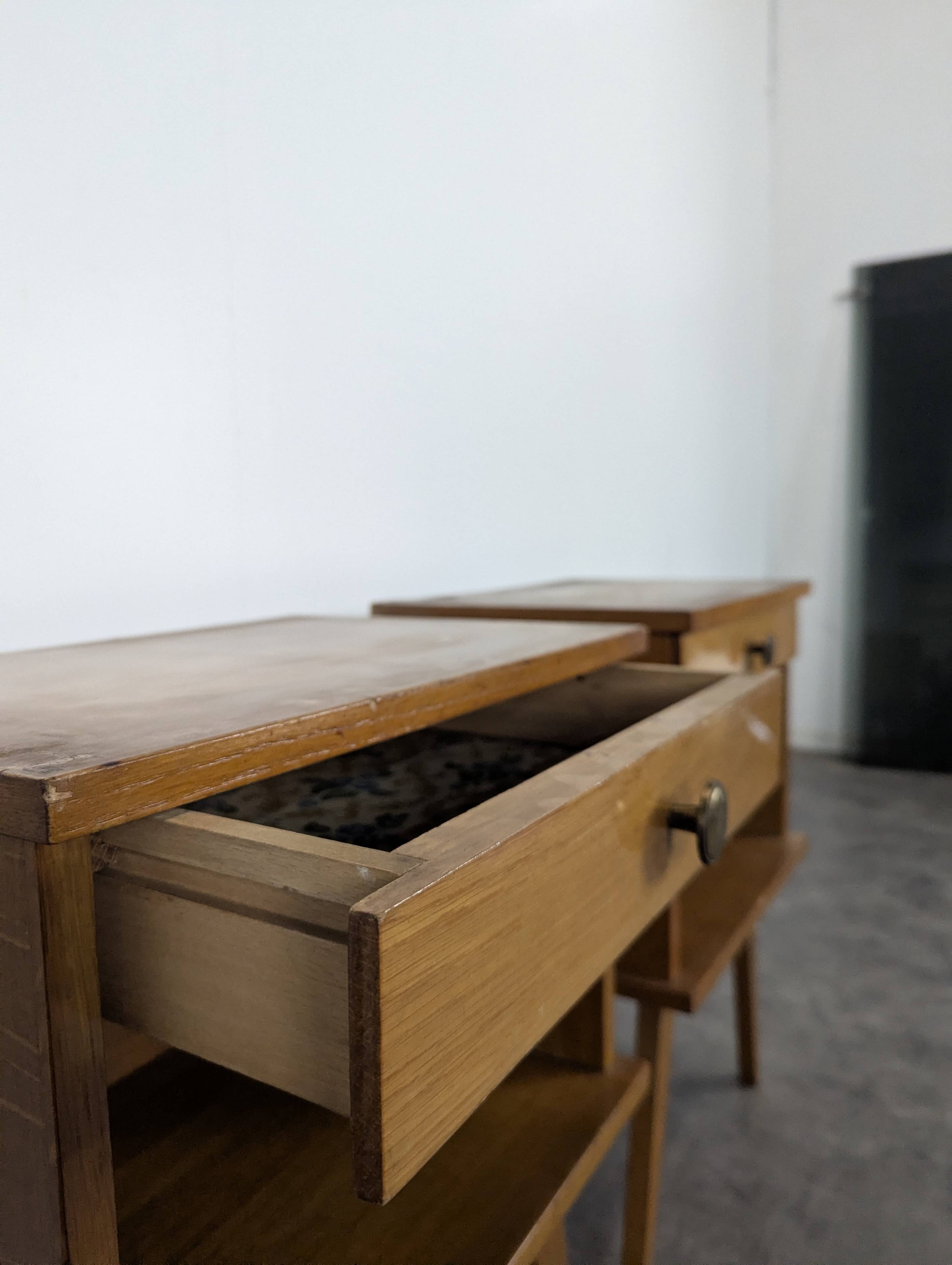 Pair of bedside tables from the 1940s Reconstruction period.