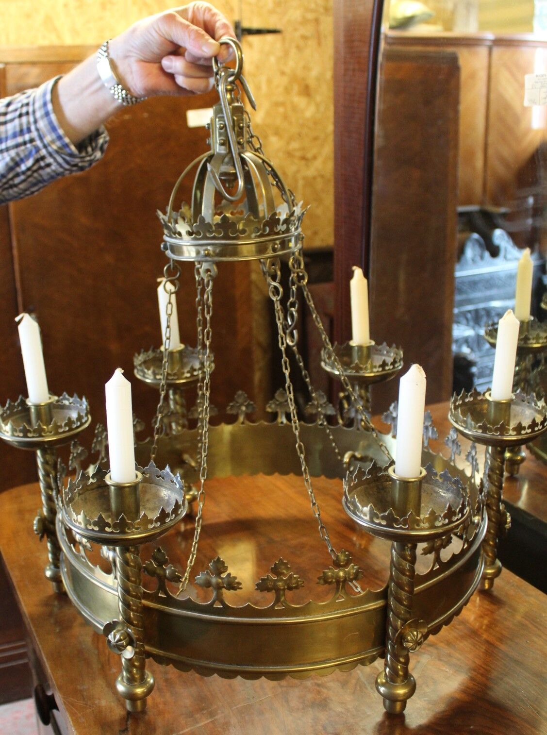 Brass chandelier in the style of Pugin with candles