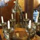 Brass chandelier in the style of Pugin with candles