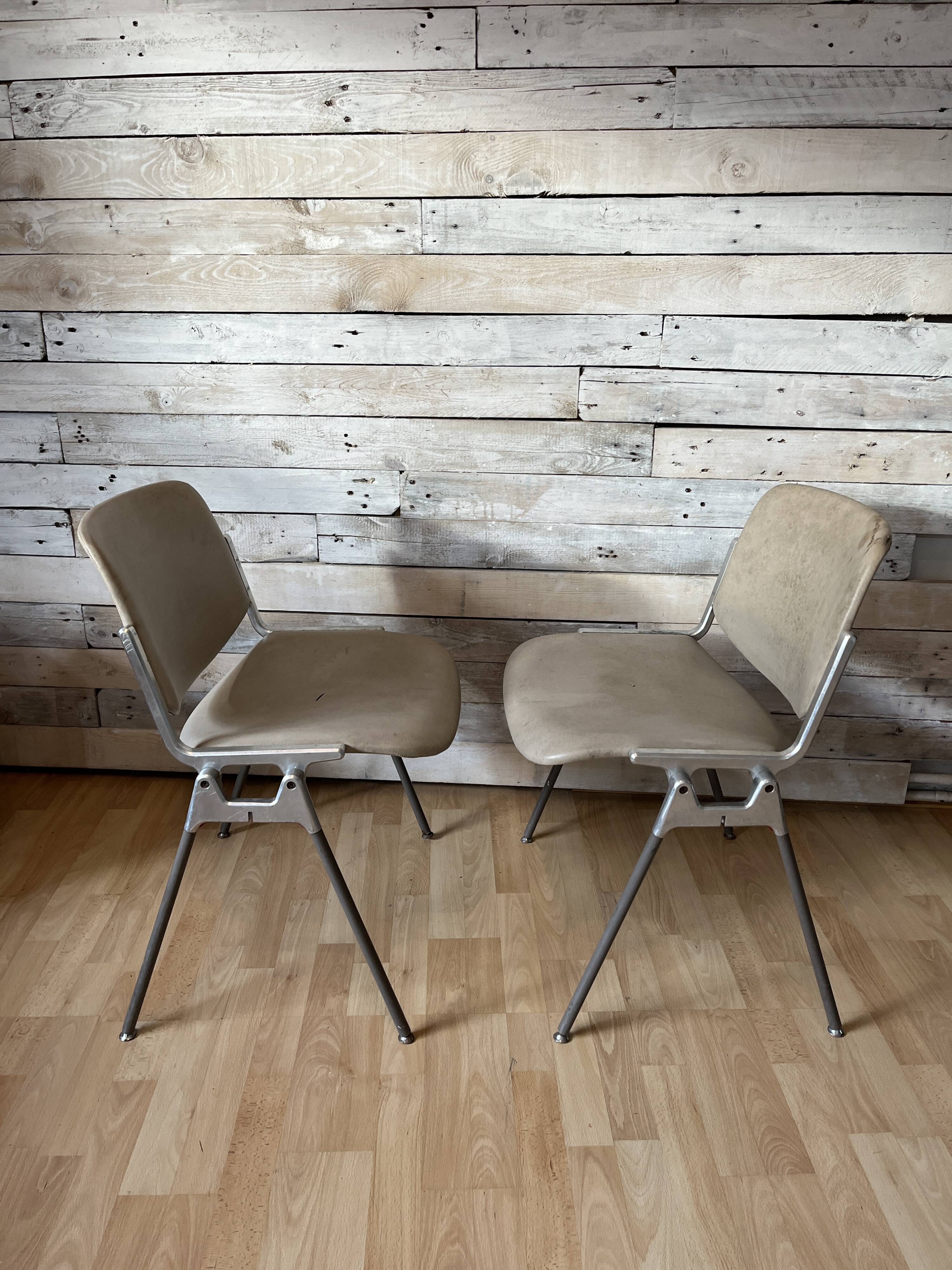 Pair of stackable chairs by Giancarlo Piretti for Castelli