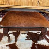 Vintage wooden and goatskin pouf