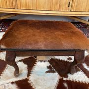 Pouf bois et peau de chèvre vintage