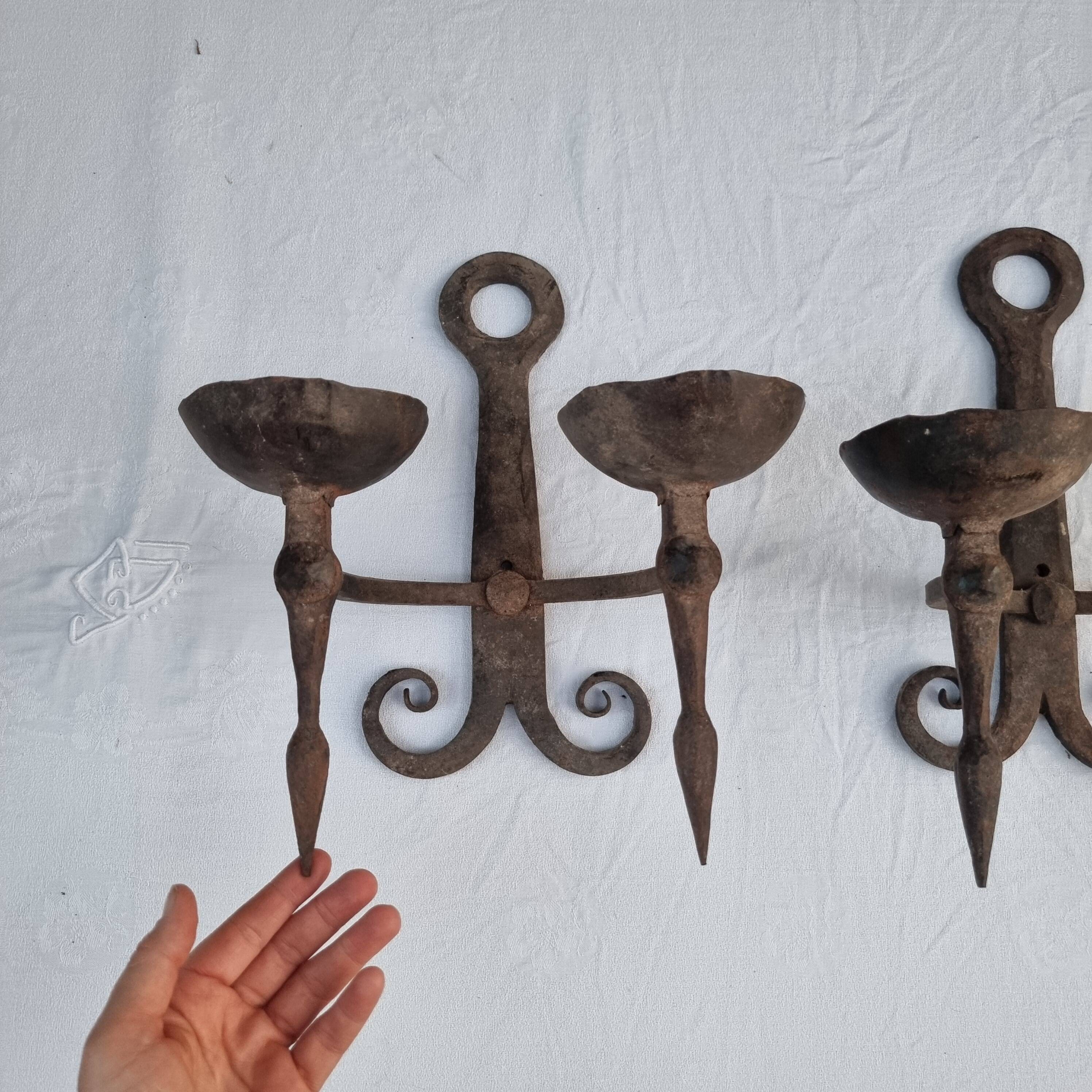 Pair of antique 15th century medieval castle wrought iron candlesticks