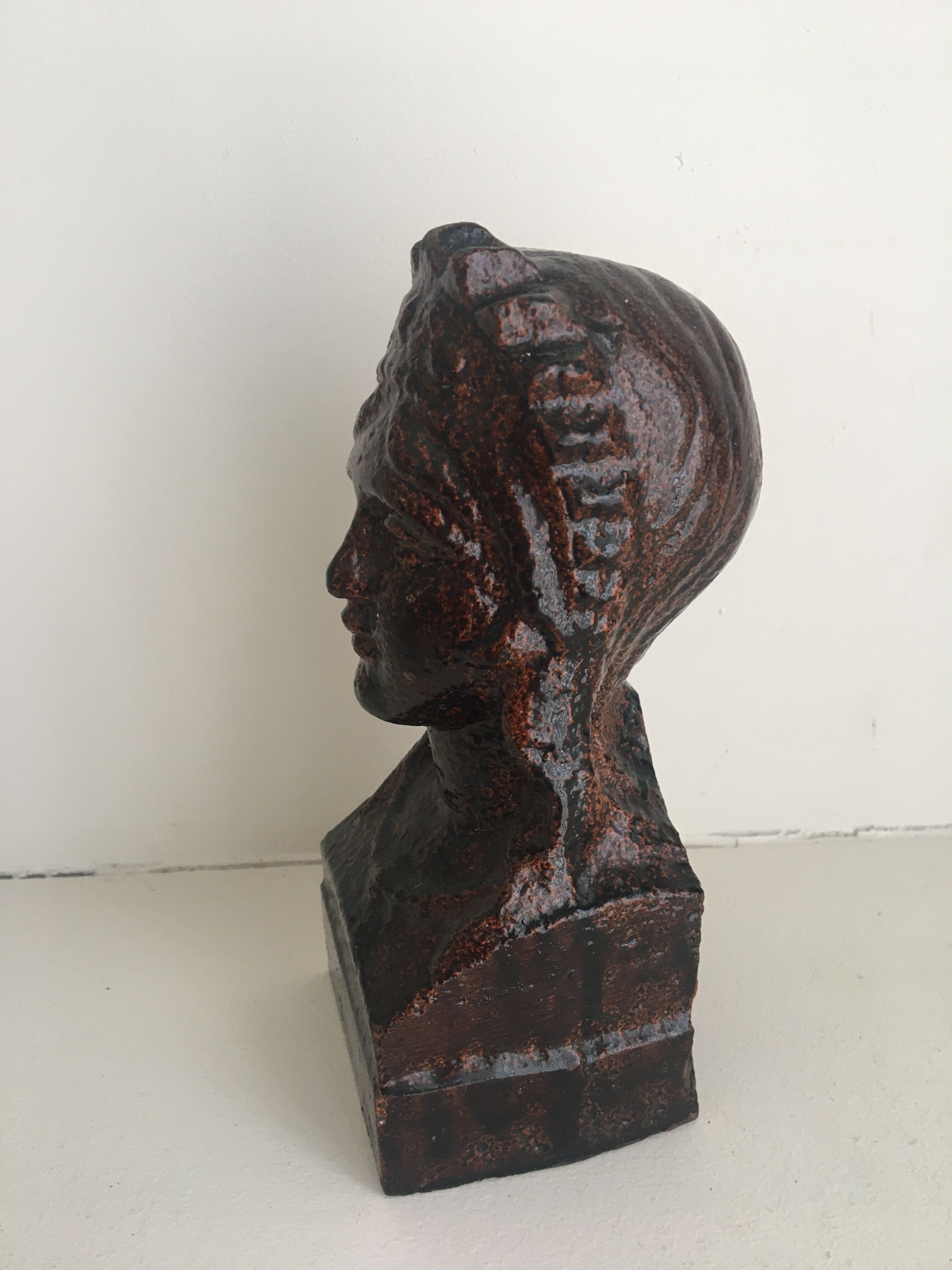 Glazed cast iron bust
