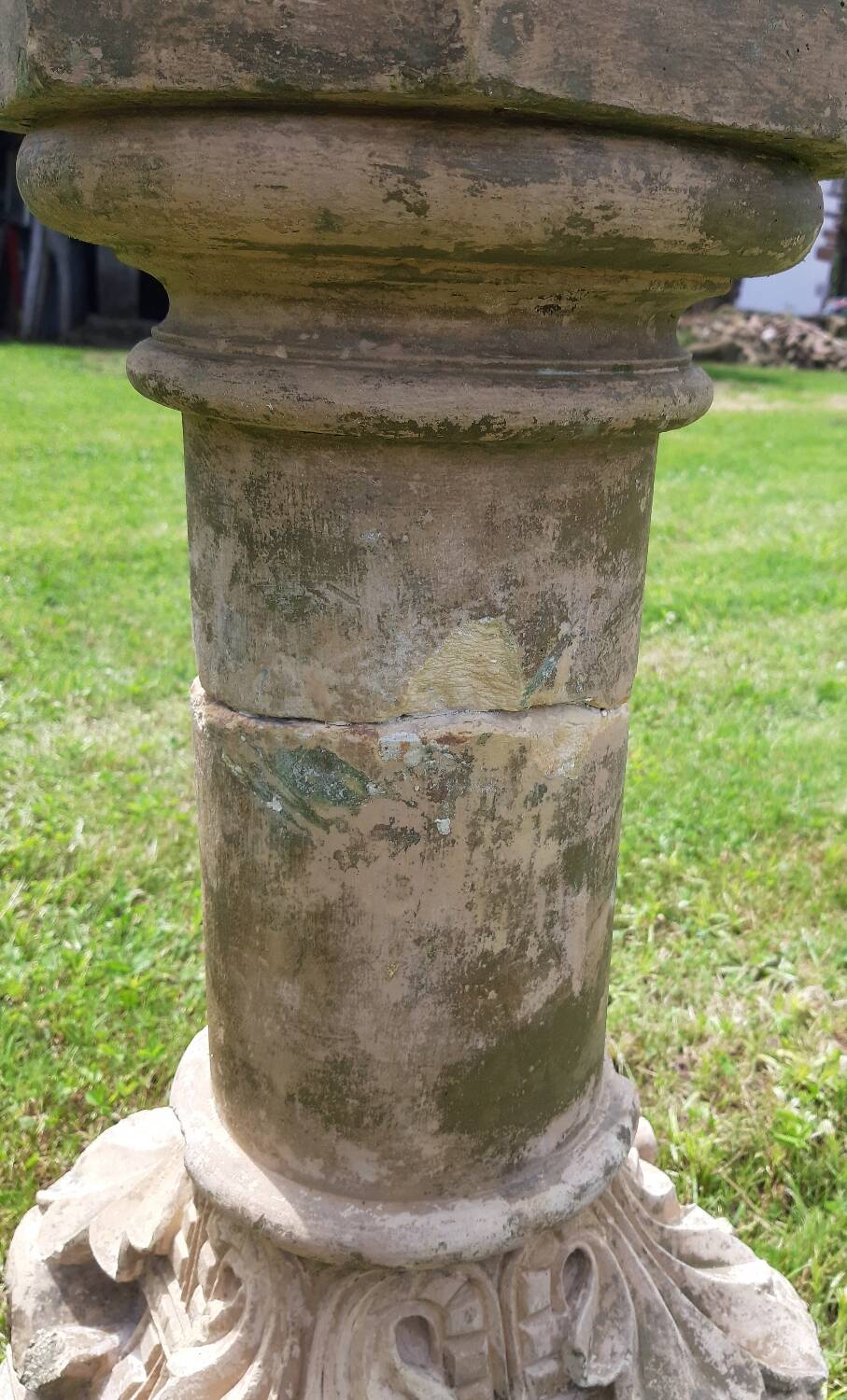 Holy water font on stone column (17th century)