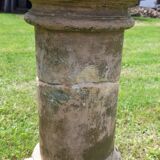 Holy water font on stone column (17th century)