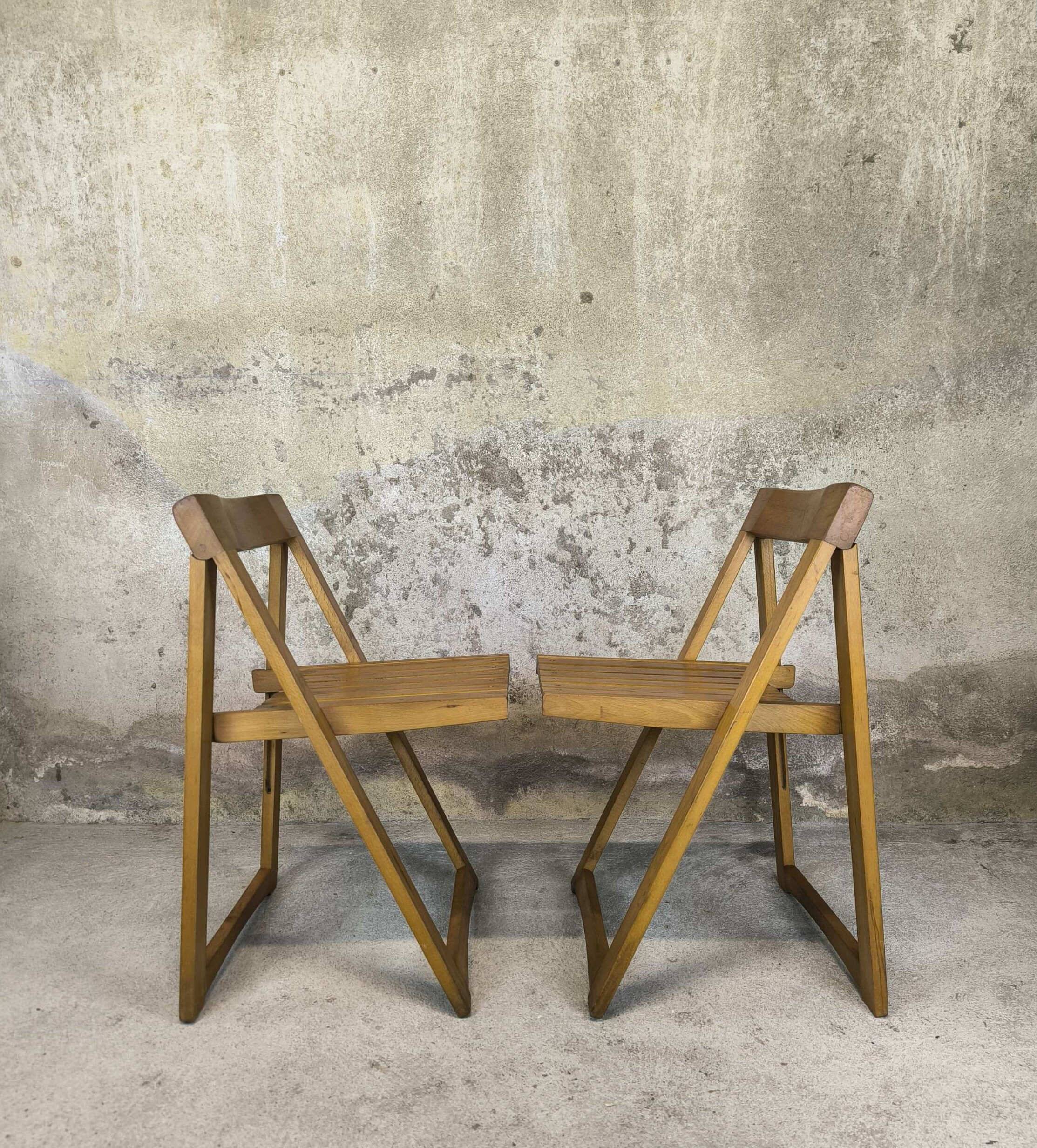 Pair of vintage folding wooden chairs by Aldo Jacober