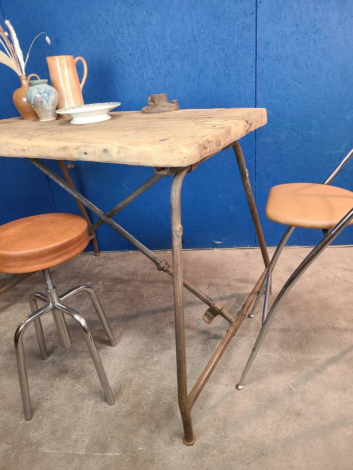 Vintage workbench circa 1930, folding metal leg.