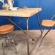 Vintage workbench circa 1930, folding metal leg.