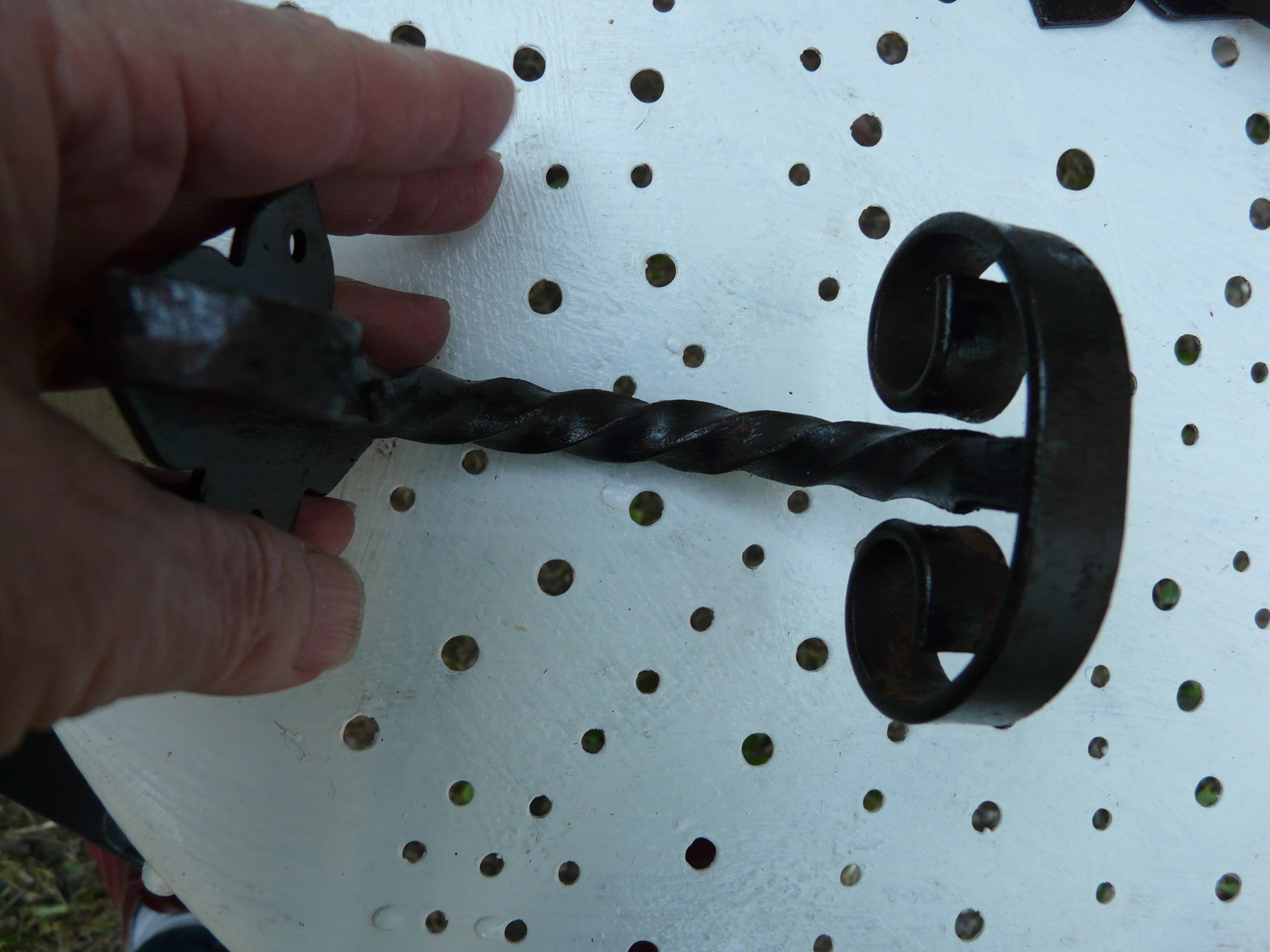 Pair of wrought iron wall hooks