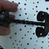 Pair of wrought iron wall hooks