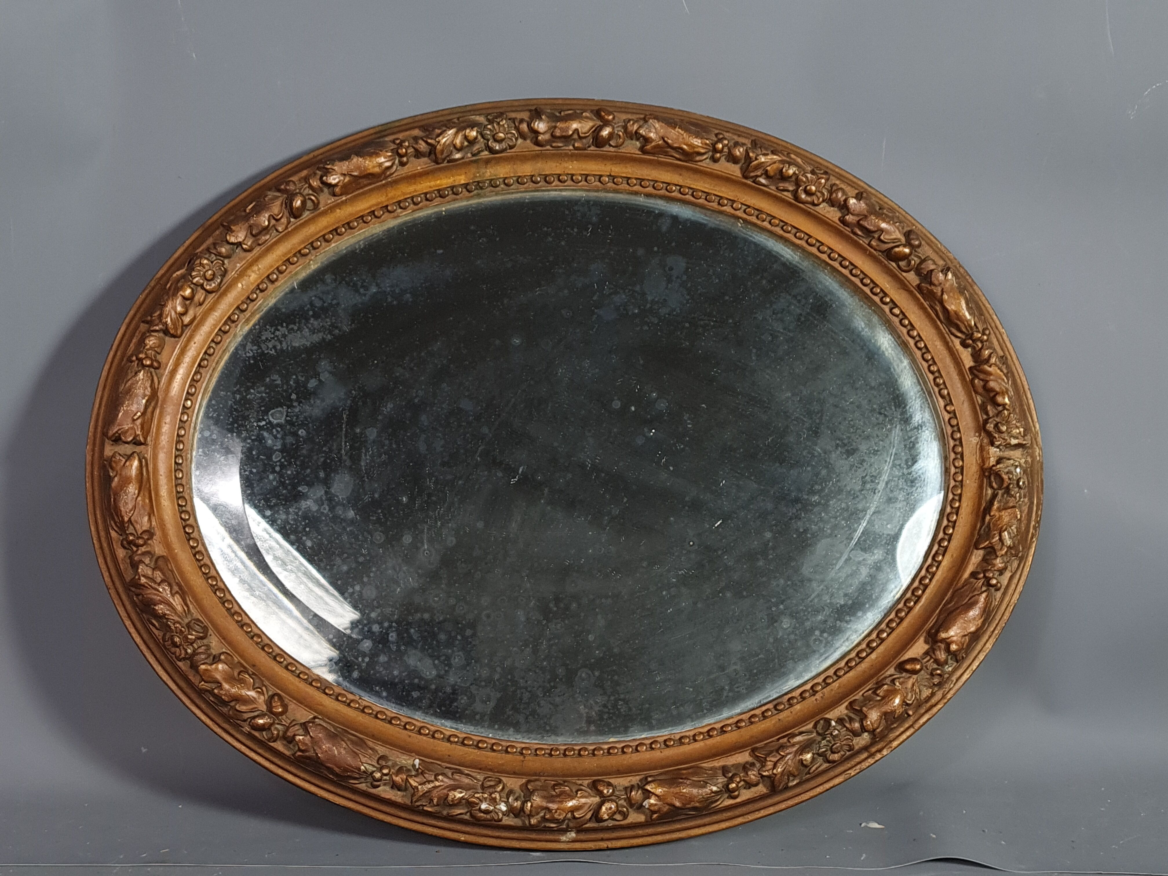 Old oval mirror beveled wooden frame & gilded stucco 50x40 cm 1900