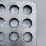 Brutalist style brushed aluminum candle holder