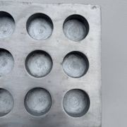 Brutalist style brushed aluminum candle holder