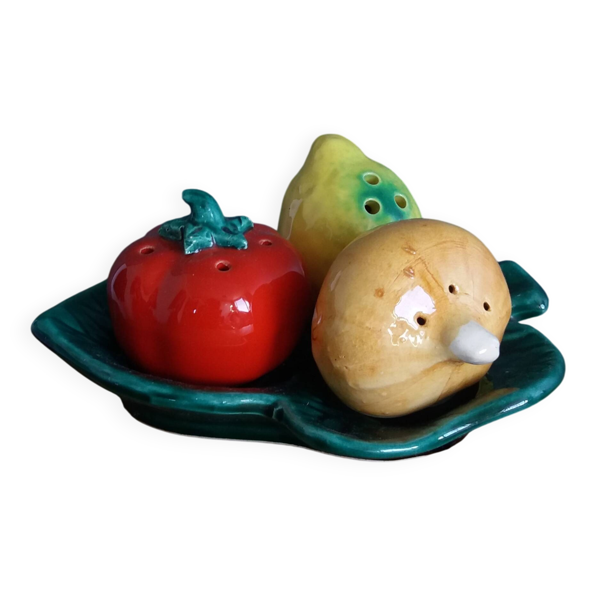 Salt and pepper shaker vegetables on a slipware leaf signed FPP Vallauris.