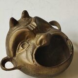 Ashtray/empty pocket devil's satyric head/diablotin, in bronze with golden patina. signed medina iran
