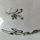 Plate on pedestal Iris Creil Montereau Terre de Fer from the 1900s