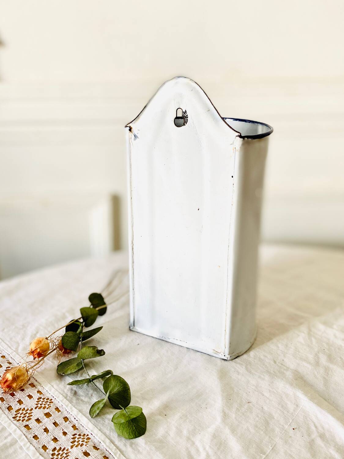 Old medical fountain in white enameled sheet metal