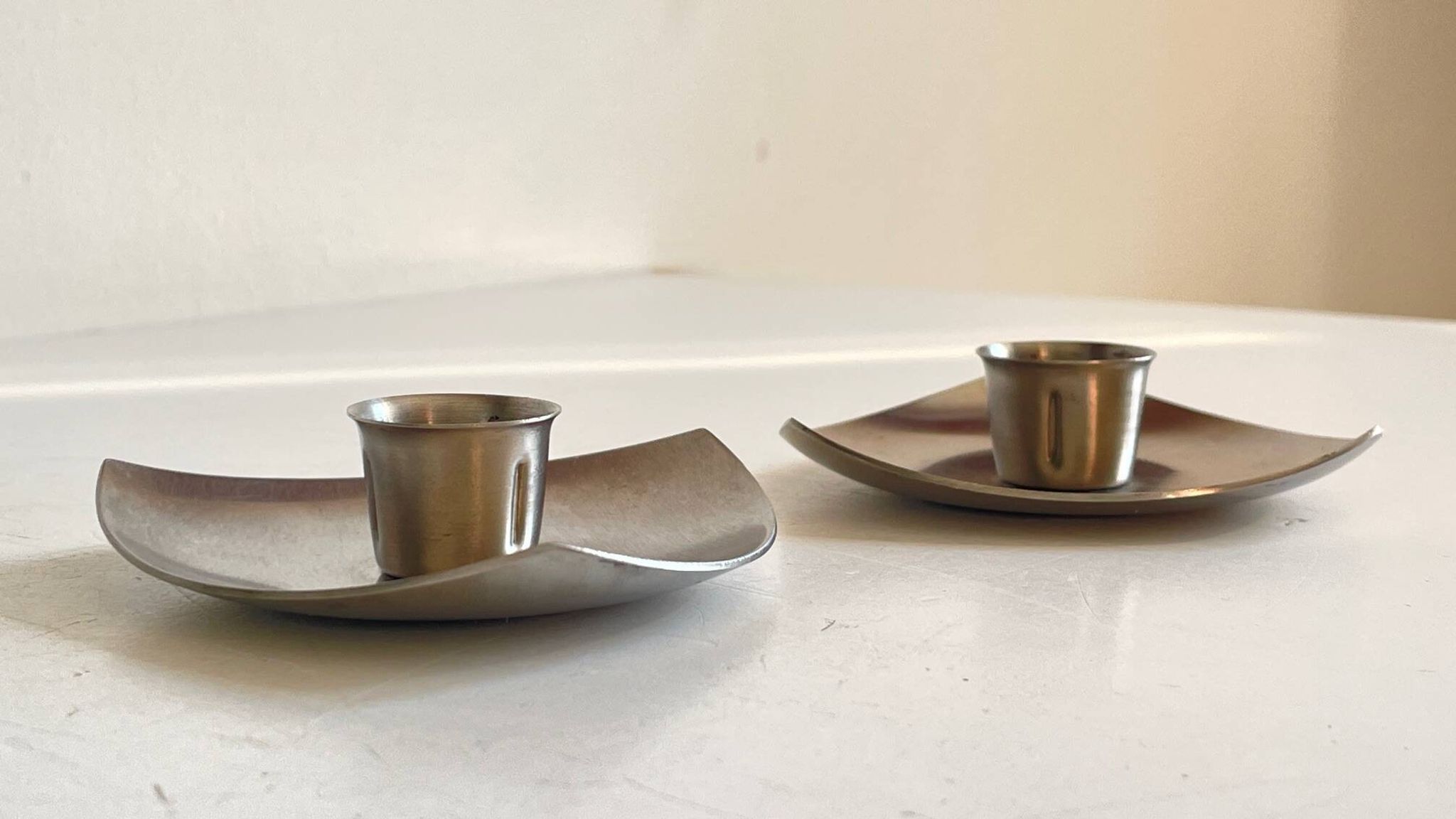 Vintage brushed metal geometric candle holders