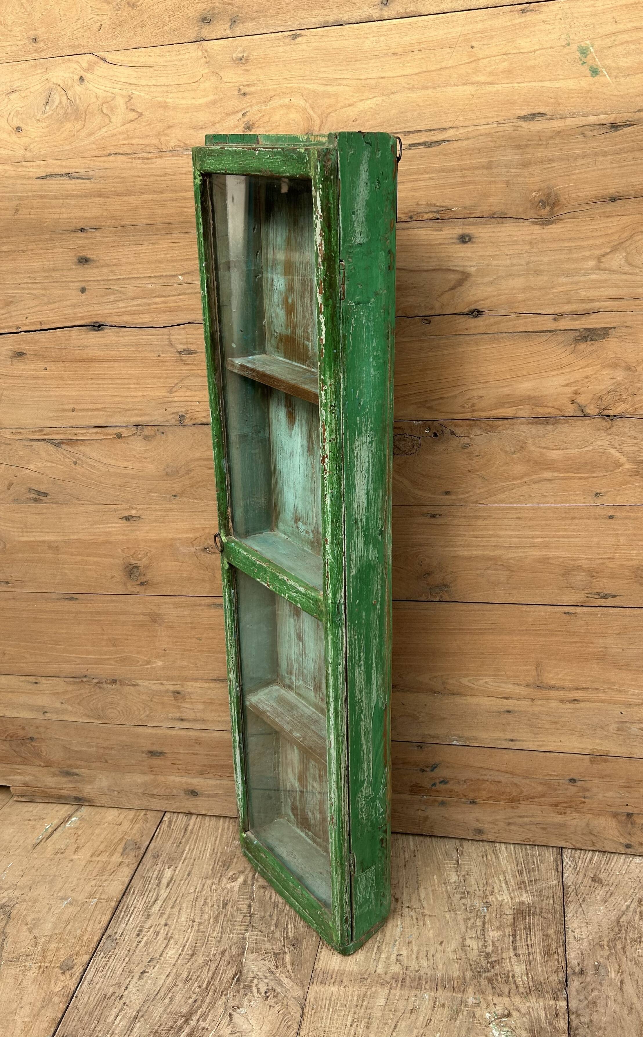Wall display cabinet in Burmese teak with original patina.