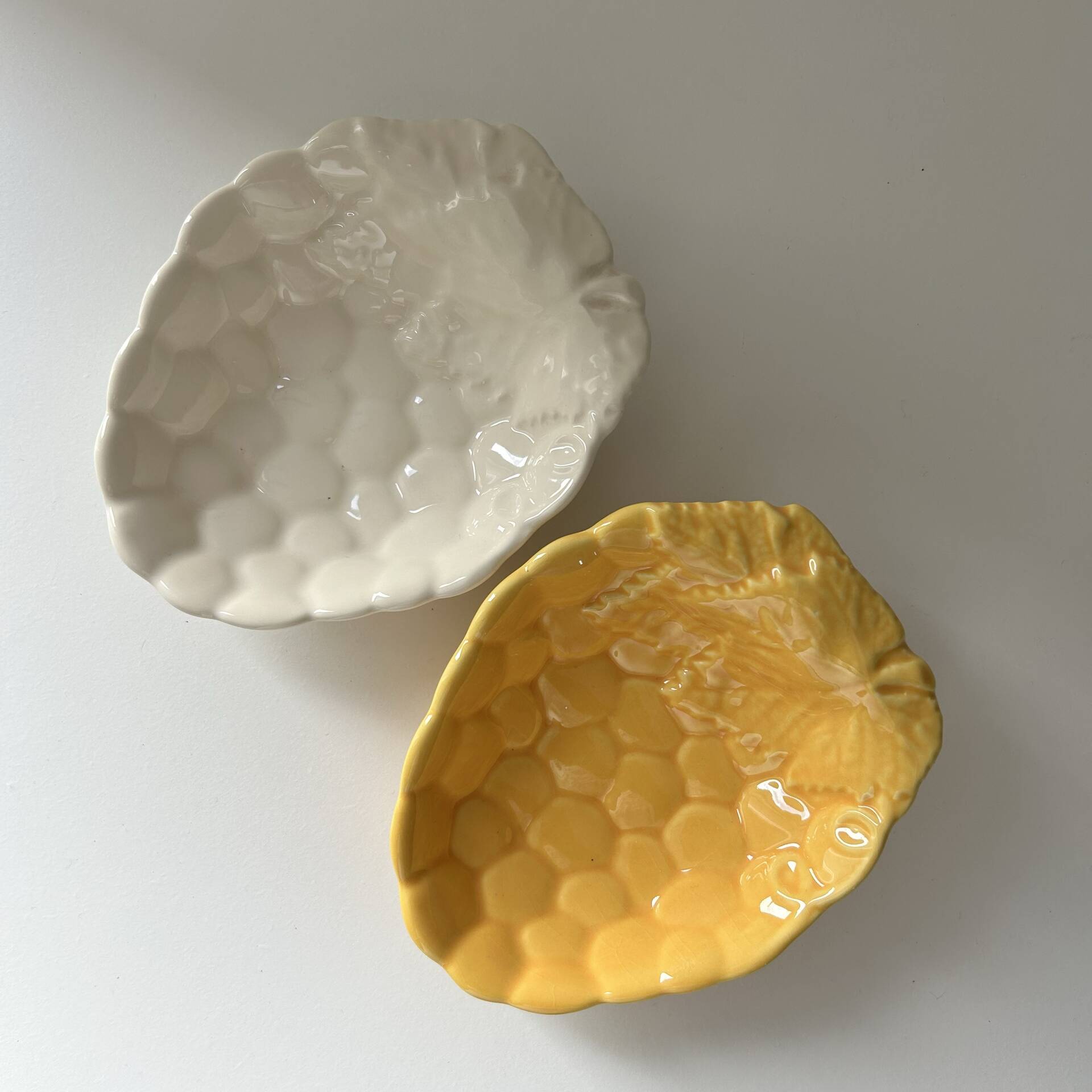 2 grape bowls in slipware