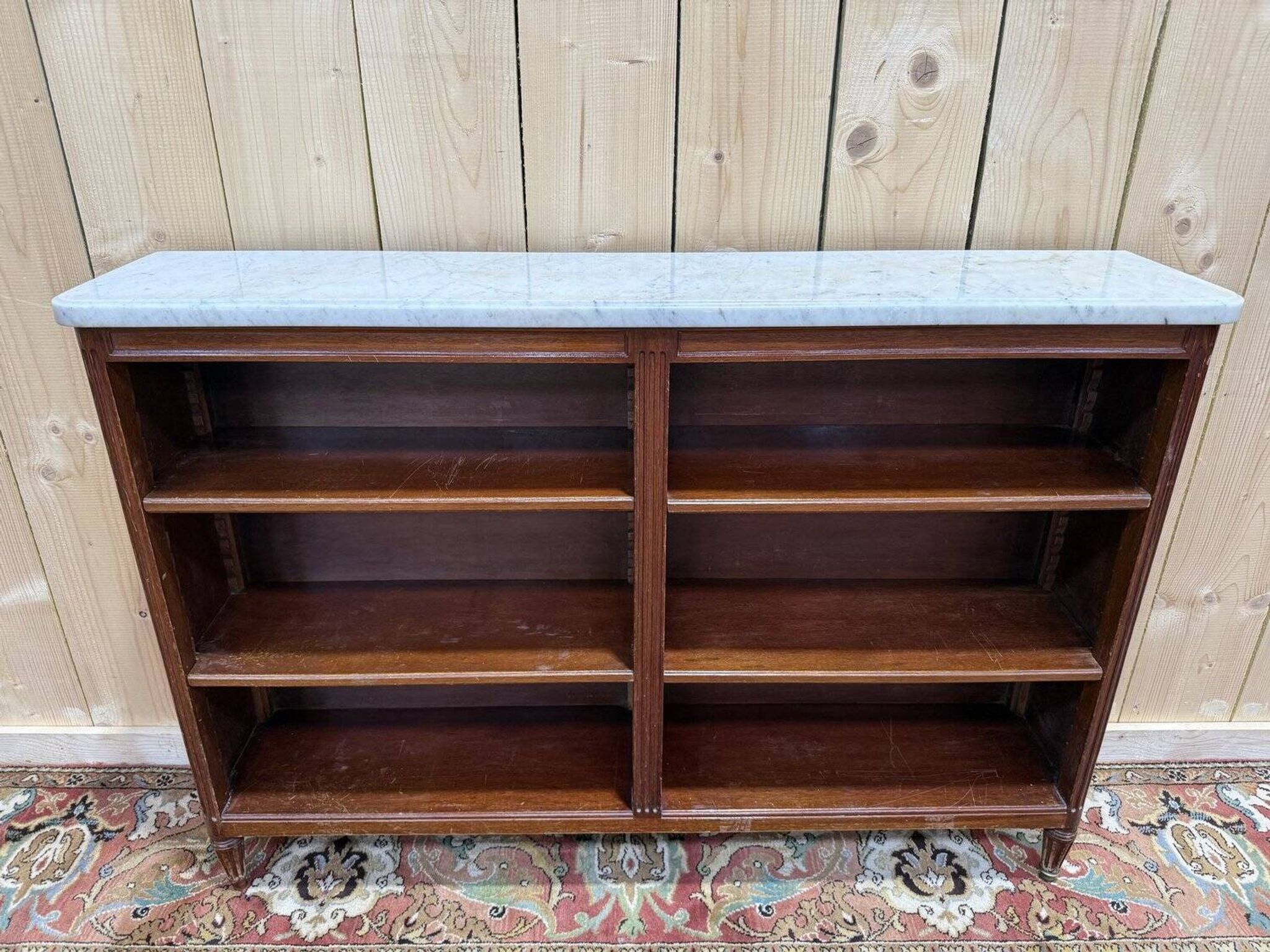 Large bookcase in the Louis XVI style.