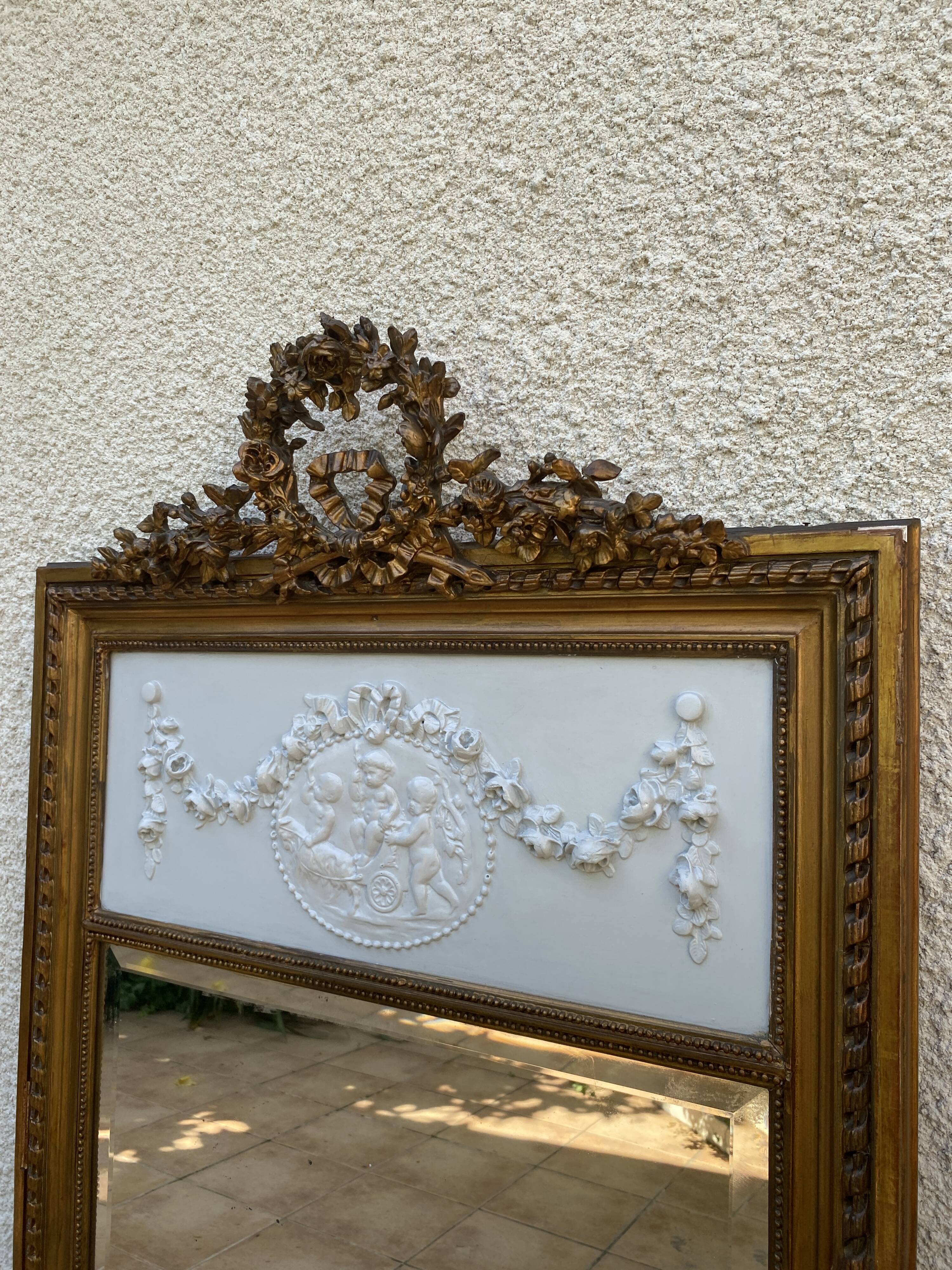 19th century Louis XVI style mirror in wood gilded with gold leaf, 74x150cm