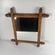 Wooden turned mirror in bamboo style, circa 1900-1930.