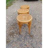 3 wooden and cane stools