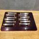 Lot of 12 crystal and gold metal knive holders