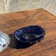 Vintage silver-plated shell butter dish with blue bowl.