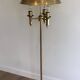 Brass floor lamp with a brass shade. Attributed to Maison Charles