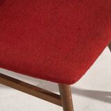 Wooden chairs with burgundy red fabric, circa 1950